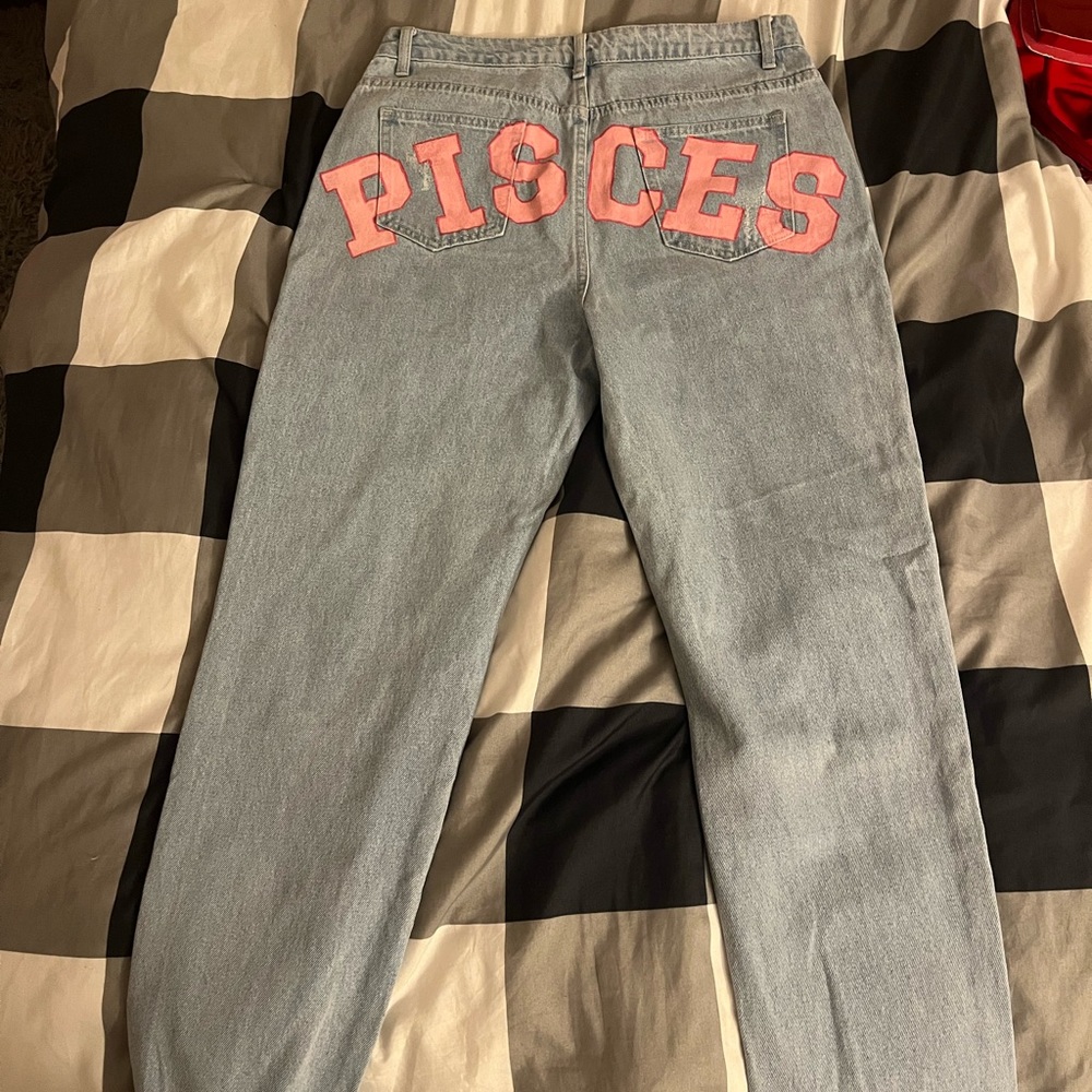 Custom made pink PISCES jeans.